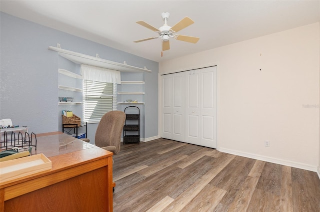 1730 Hudson St, Englewood, FL 34223 - office space featuring ceiling fan, wood finished floors, and baseboards