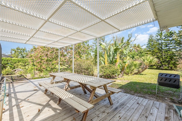 1730 Hudson St, Englewood, FL 34223 - wooden terrace with a pergola, outdoor dining space, and a lawn