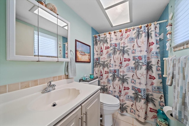 full bath with vanity, tile patterned flooring, toilet, and a shower with curtain