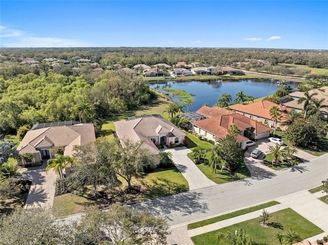 bird's eye view featuring a residential view and a water view