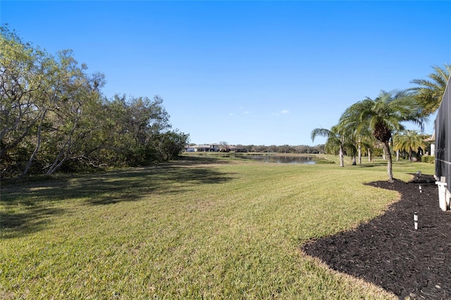 view of yard with a water view