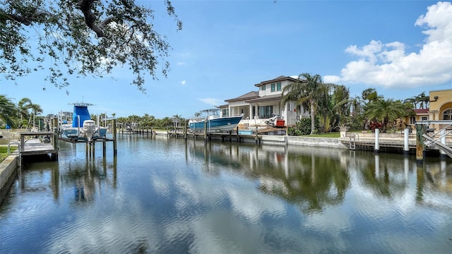 property view of water featuring a dock and boat lift