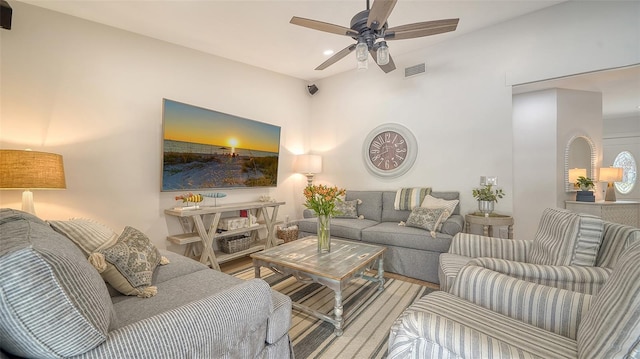 living room featuring visible vents, a ceiling fan, and recessed lighting