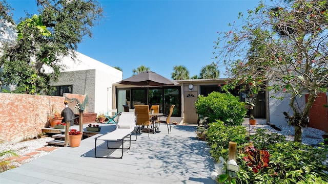 view of patio / terrace featuring outdoor dining area and fence