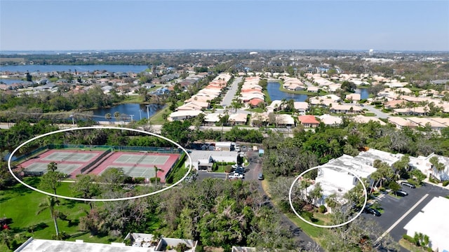 aerial view featuring a water view and a residential view