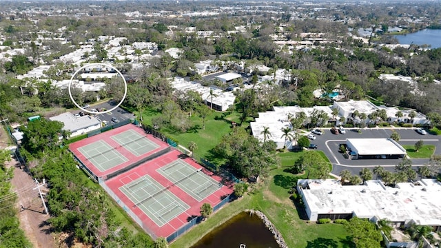 bird's eye view with a water view