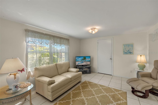 living area with light tile patterned floors