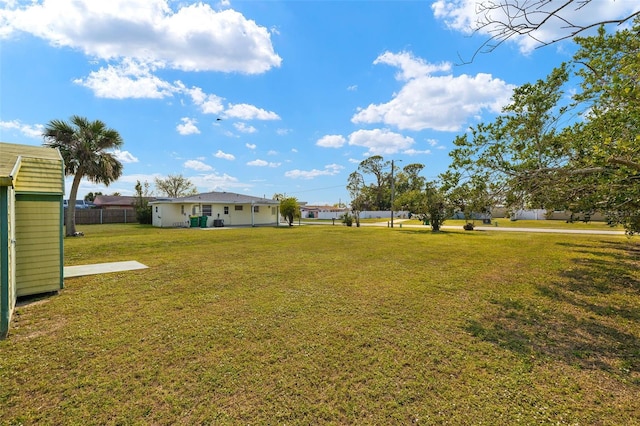 view of yard with fence