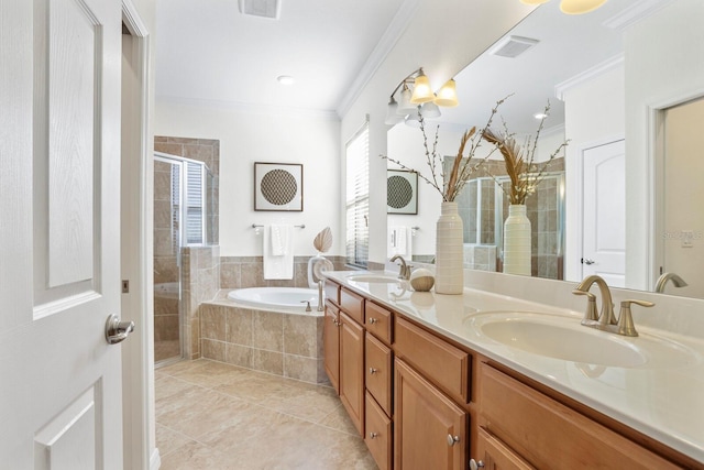 full bath with ornamental molding, a stall shower, a garden tub, and a sink