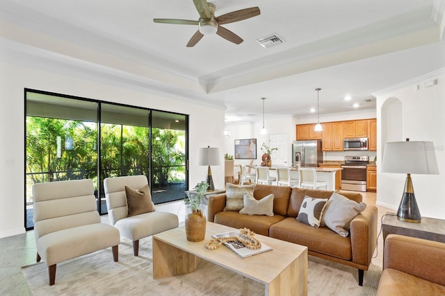 living room with visible vents, baseboards, a ceiling fan, light tile patterned flooring, and recessed lighting