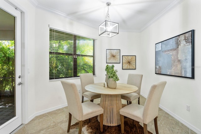 dining room featuring a notable chandelier, crown molding, baseboards, and light tile patterned floors