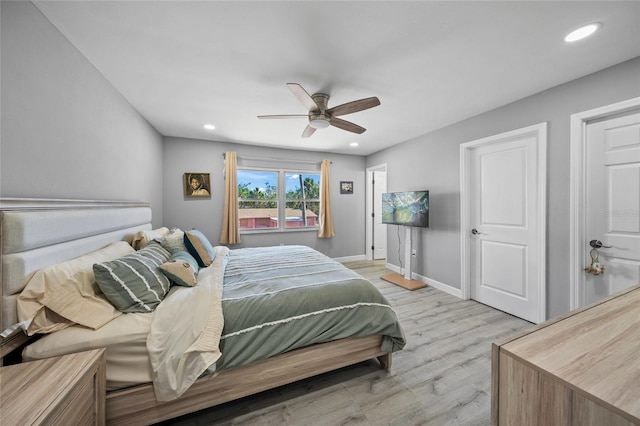 691 Gulf Bay Rd, Longboat Key, FL 34228 - bedroom with light wood-type flooring, baseboards, a ceiling fan, and recessed lighting