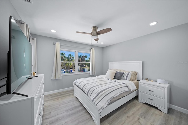 691 Gulf Bay Rd, Longboat Key, FL 34228 - bedroom with light wood-style floors, baseboards, recessed lighting, and a ceiling fan
