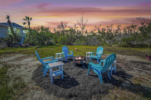 691 Gulf Bay Rd, Longboat Key, FL 34228 - view of yard with a fire pit