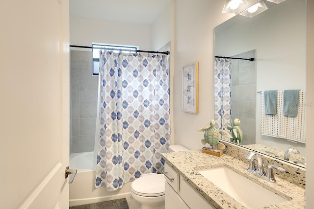 full bathroom with shower / tub combo, vanity, and toilet