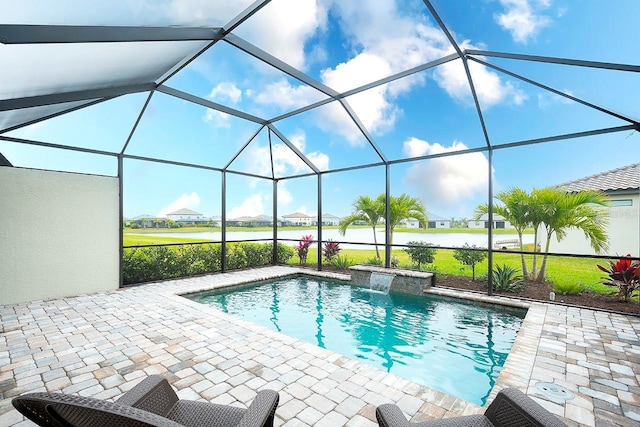 outdoor pool with a patio area and a lanai