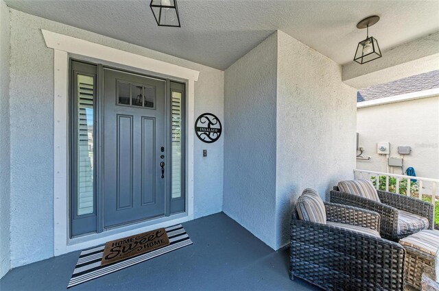 5709 Sunflower Cir, Sarasota, FL 34238 - property entrance featuring stucco siding