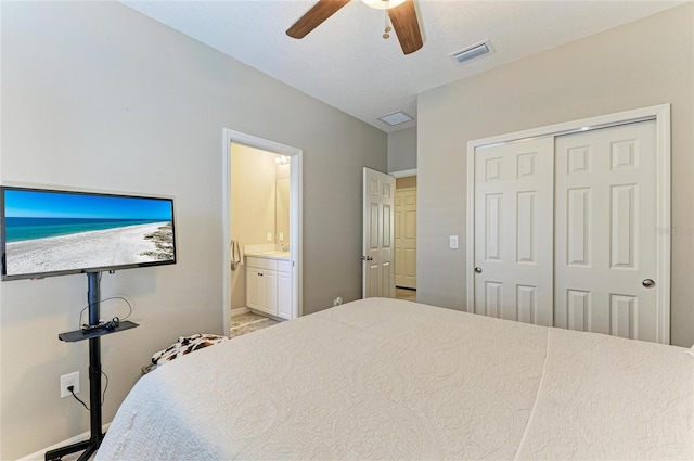 5709 Sunflower Cir, Sarasota, FL 34238 - bedroom with visible vents, baseboards, a ceiling fan, ensuite bath, and a closet