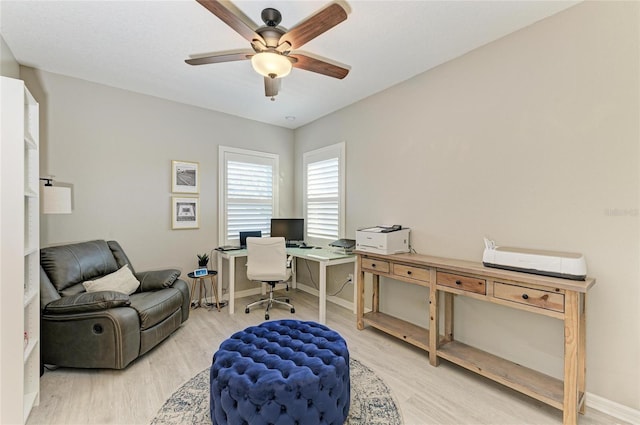 5709 Sunflower Cir, Sarasota, FL 34238 - office space with baseboards, a ceiling fan, and wood finished floors