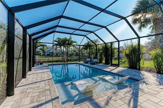 5709 Sunflower Cir, Sarasota, FL 34238 - pool featuring a patio and glass enclosure