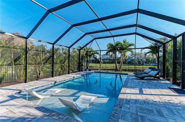5709 Sunflower Cir, Sarasota, FL 34238 - view of pool with a fenced in pool, glass enclosure, and a patio