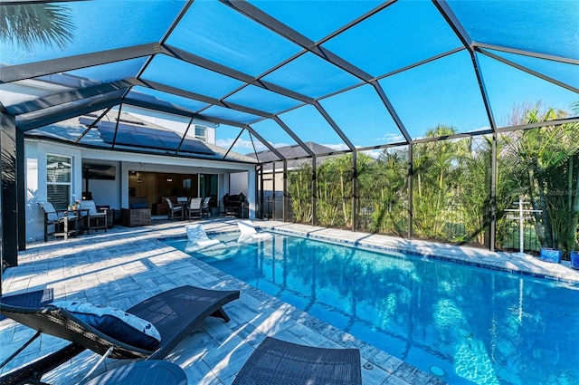 5709 Sunflower Cir, Sarasota, FL 34238 - outdoor pool with glass enclosure, outdoor lounge area, outdoor dining area, and a patio area