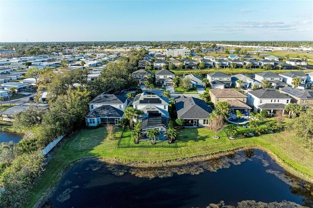 5709 Sunflower Cir, Sarasota, FL 34238 - birds eye view of property featuring a water view and a residential view