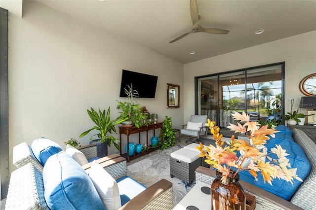 living room featuring ceiling fan