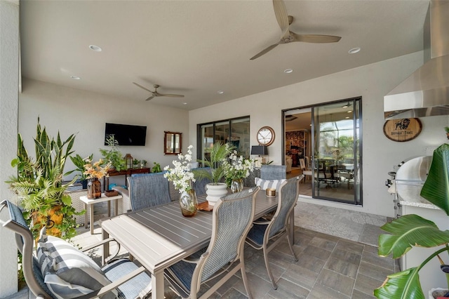 dining space featuring a ceiling fan and recessed lighting