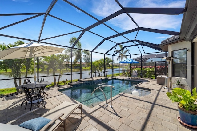 pool featuring a water view, a lanai, and a patio