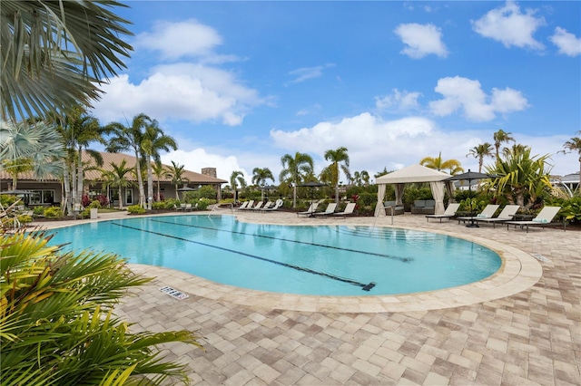 community pool featuring a patio