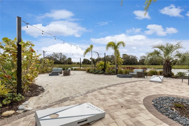 view of patio / terrace featuring fence and an outdoor living space