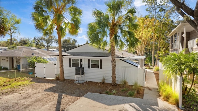 view of front of house featuring a gate and fence