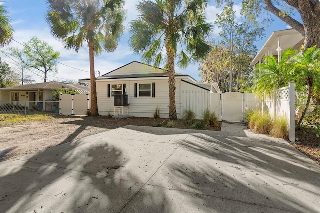 bungalow with fence and a gate