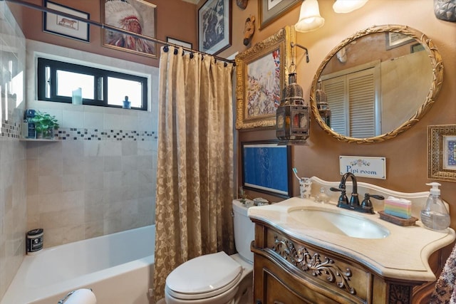 full bath featuring shower / bath combo, vanity, and toilet