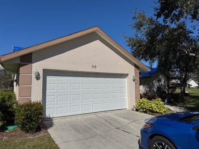 garage with driveway