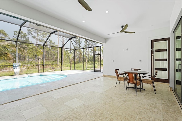 view of swimming pool with a ceiling fan