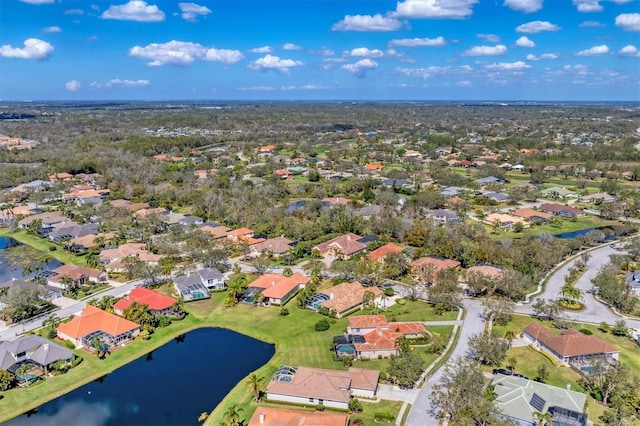 bird's eye view with a water view and a residential view