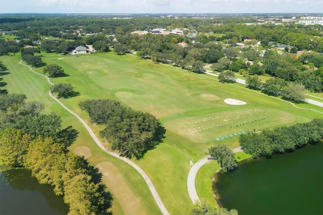 birds eye view of property featuring a water view and golf course view