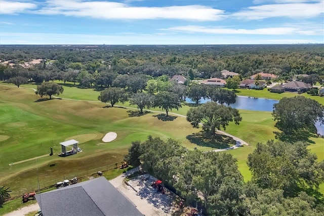 aerial view with view of golf course and a water view