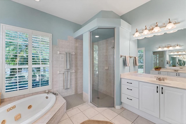 9612 Old Hyde Park Pl, Bradenton, FL 34202 - bathroom featuring a tub with jets, a tile shower, vanity, and tile patterned floors