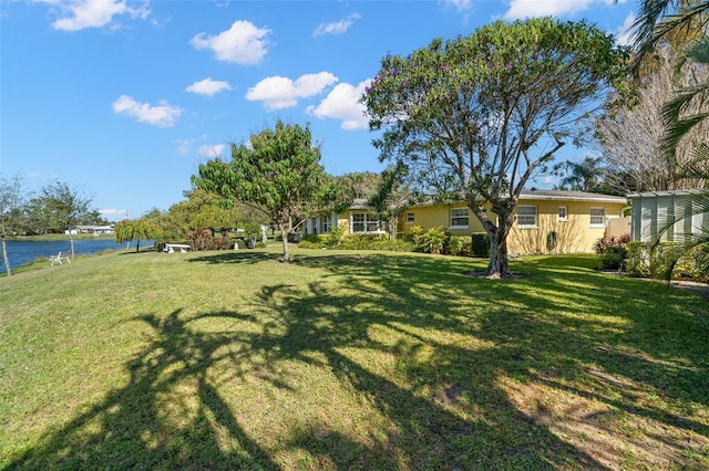 view of yard with a water view