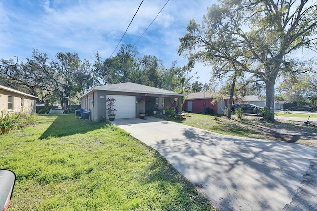 ranch-style house featuring a garage, stucco siding, concrete driveway, and a front yard