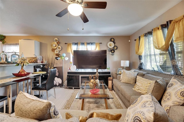 living room with ceiling fan