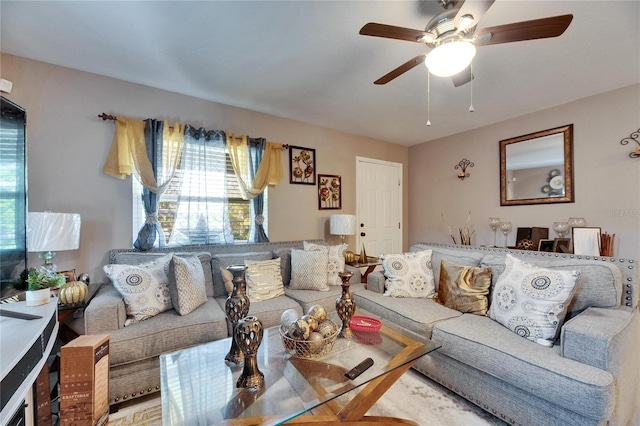 living area with ceiling fan