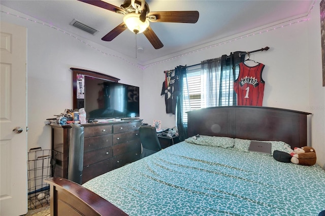 bedroom featuring visible vents and a ceiling fan