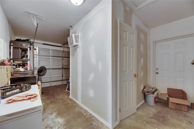 garage featuring baseboards