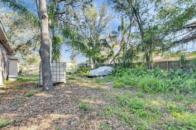 view of yard featuring fence