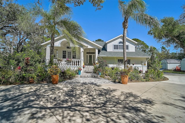 view of front of home with stucco siding and covered porch