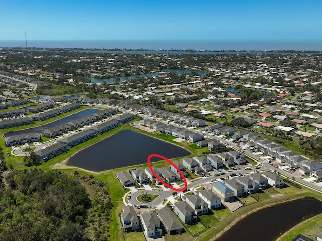 aerial view with a water view and a residential view